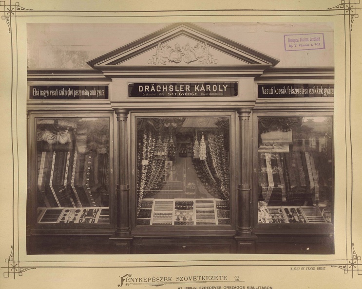 Millenniumi kiállítás: Drächsler Károly első magyar vasúti szükségleti paszomány- és vasúti kocsik felszerelési cikkek gyárának (Pozsony-Szentgyörgy) vitrinje. A felvétel 1896-ban készült. A kép forrását kérjük így adja meg: Fortepan / Budapest Fővár